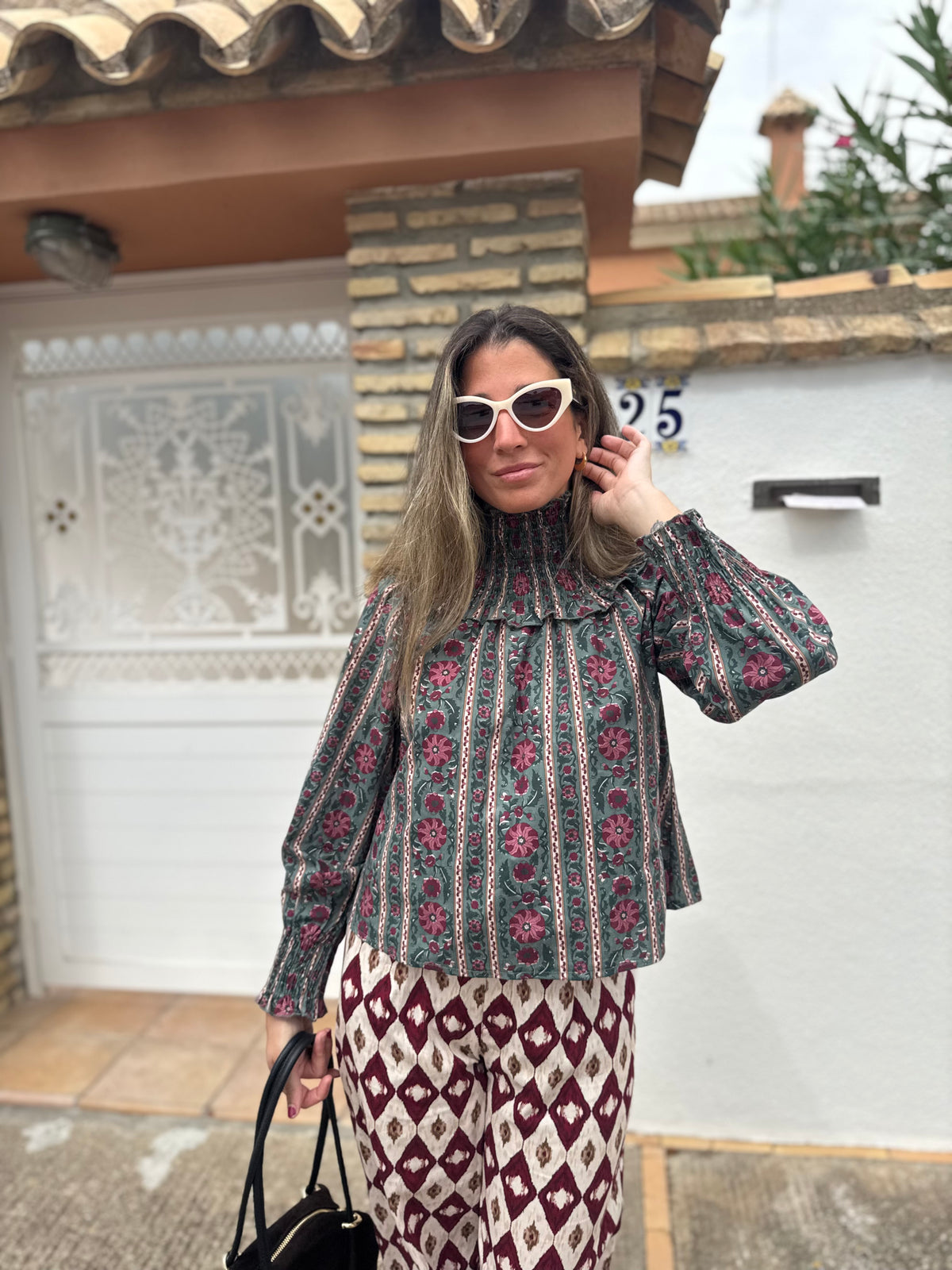 BLUSA CUELLO NIDO
