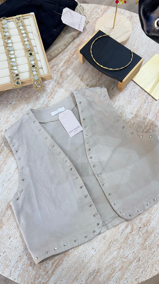 Chaleco tachuelas beige
