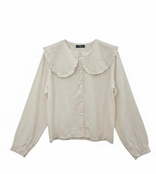 Blusa cuello babero crema