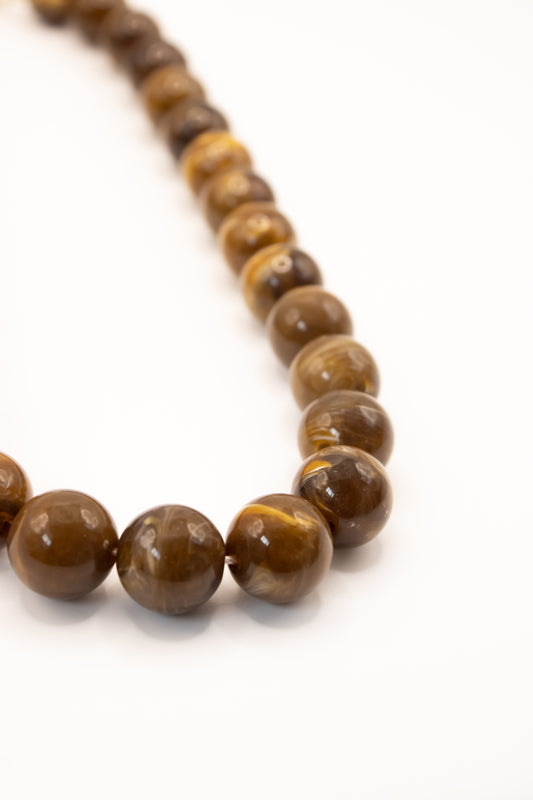Collar bolas marrón